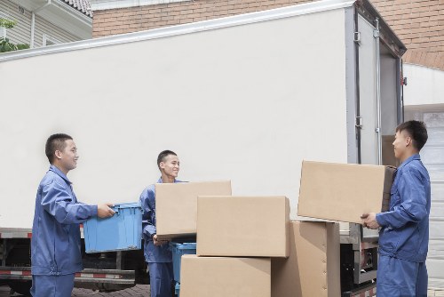 Moving van with recyclable household items in Stamford Hill