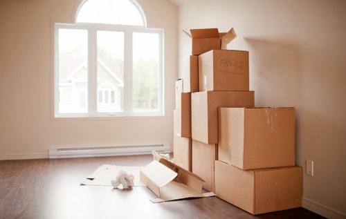 Completed complaints procedure documents beside moving boxes
