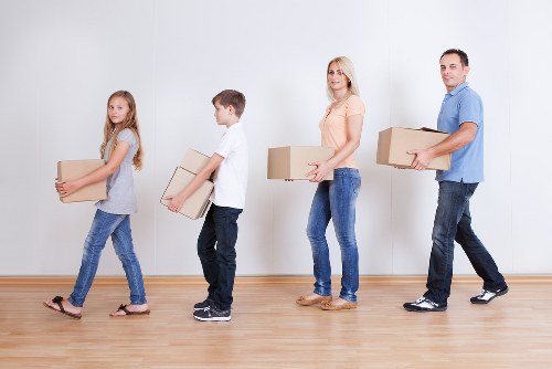 Packed boxes and furniture prepared for local relocation